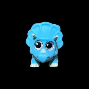 Disney Doorables: Series 10 Figurine – Toy Story – Trixie Blue Dinosaur